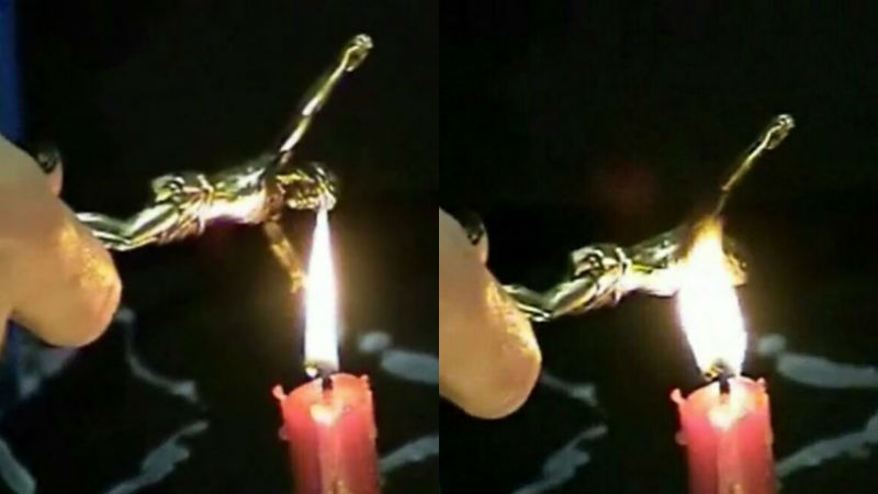 워마드에 올라온 예수상과 성체 태우는 모습(사진=워마드 홈페이지 캡처)