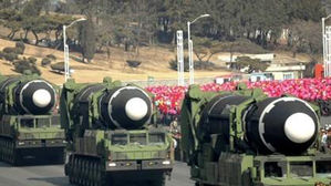 북한, 전원회의 영상에 ICBM 등 과거 무기사진 공개