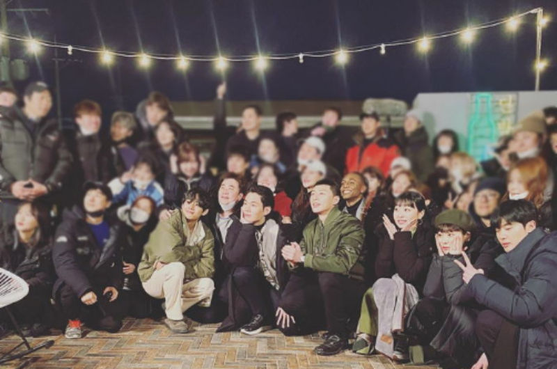 V Spotted in a Group Photo of Park Seo Jun's Drama Team
