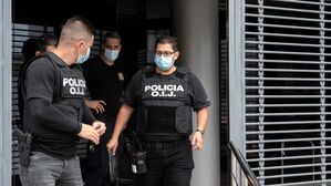 14일(현지시간) 정부기관 건물 수색하는 코스타리카 경찰 (사진=AFP, 연합뉴스)