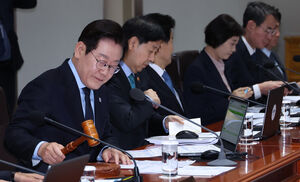 2035 NDC '53∼61%' 확정…이 대통령 "피할 수 없는 길"