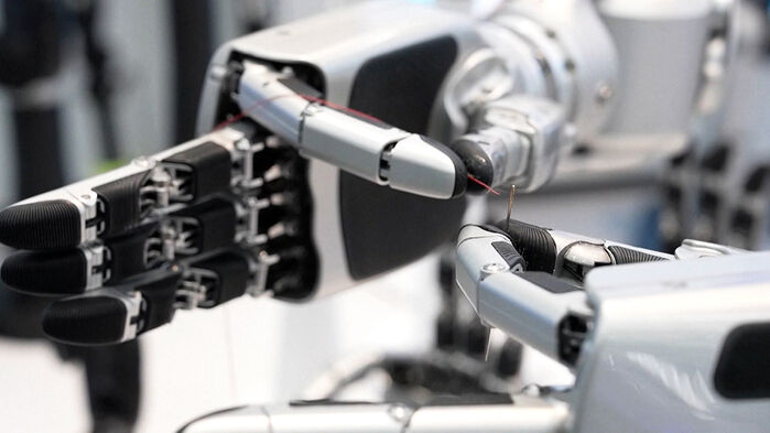 Humanoid Robot Begging on the Street? QR Code for Cash Transfers Spotted