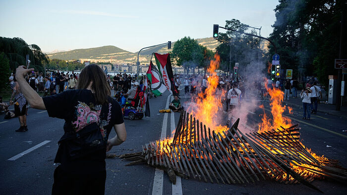 Burning Vehicles, Choking Tear Gas: Violent Protests Ahead of G7 Summit