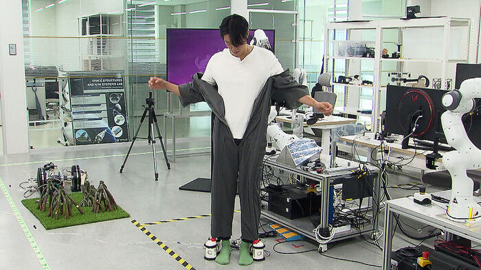 "Like Iron Man": New Tech Automatically Dresses You with the Push of a Button