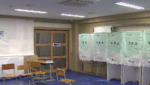 '투표 인증샷' 기소 피의자 벌금 30만 원 선고