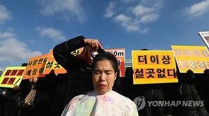 [핫포토] "북수원민자도로 건설 반대" 학부모들도 삭발