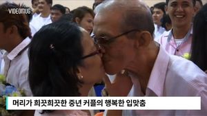 [비디오머그] 700명 한데 모여 '행복한 키스'&hellip;대규모 합동 결혼식