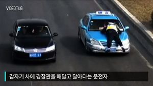 [비디오머그] 교통경찰 차에 매달고, 치고&hellip;공포의 中 운전자