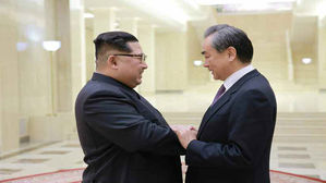 北 중앙통신 "김정은, 왕이 접견…폭넓고 깊은 의견 교환"