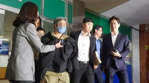 드루킹, 12시간 경찰 조사받고 구치소로