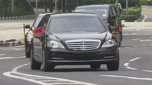 金, 삼엄한 경호 속 호텔 도착…리셴룽 총리 회담 예정