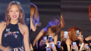 [SBS Star] VIDEO: HyunA Falls Hard While Performing in the Heavy Rain