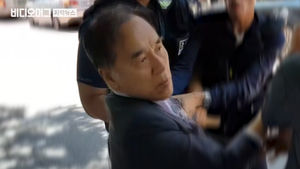 '명성교회 세습 반대' 시위에 낫 휘두른 전 의원 체포