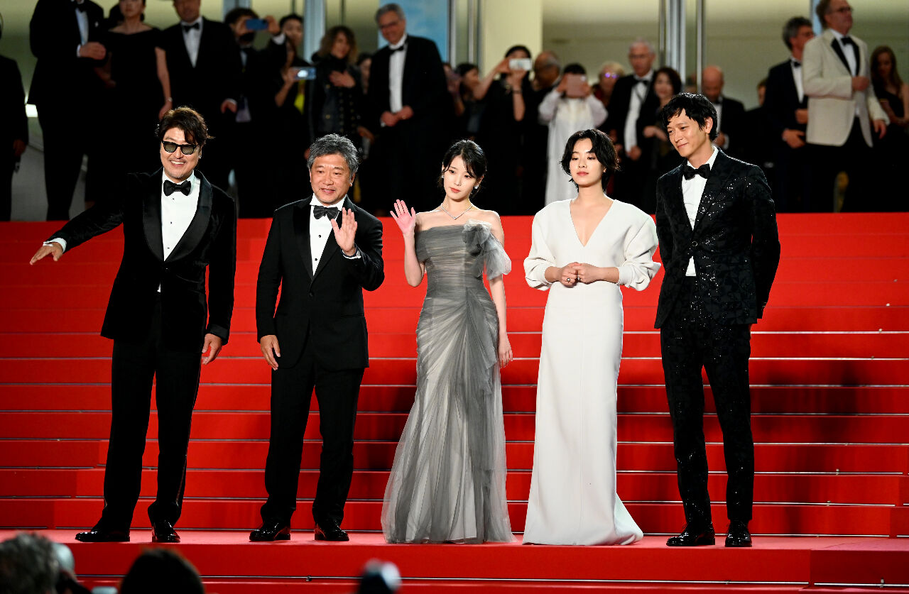 French Beauty Influencer Apologizes for Bumping Into IU at the Cannes Red Carpet