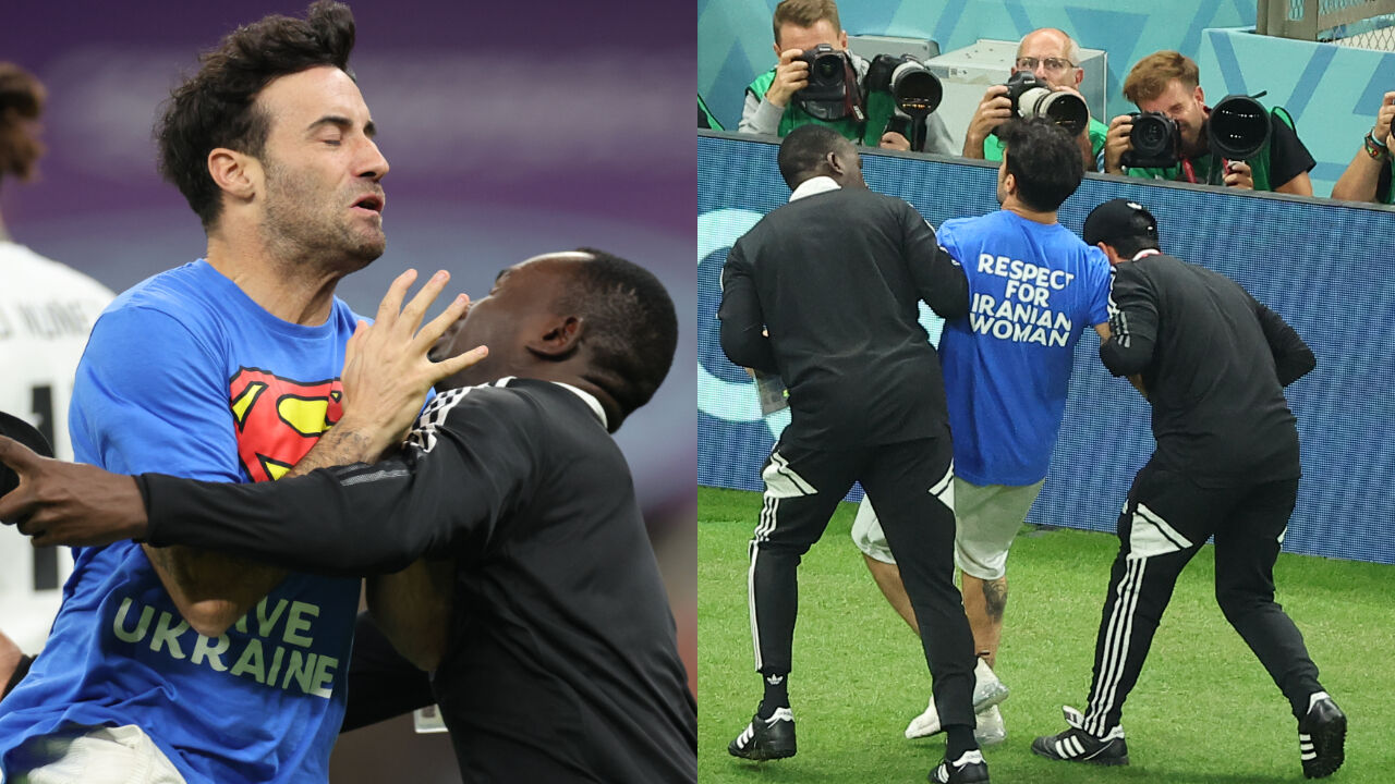 검은색 경기장 보안요원에게 붙잡혀 퇴장 당한 난입 관중.？ (사진=연합뉴스)