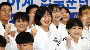 "메달 들고 오겠다" 후배들과 약속 지킨 허미미