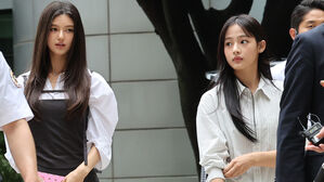 법원 나타난 뉴진스, 취재진 질문에…고개 숙이더니