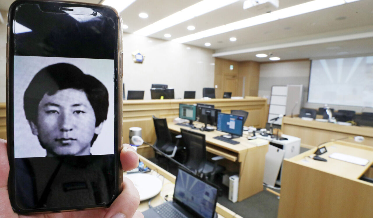 '이춘재 연쇄살인' 용의자 몰린 고 윤동일 씨 재심서 무죄…33년 만