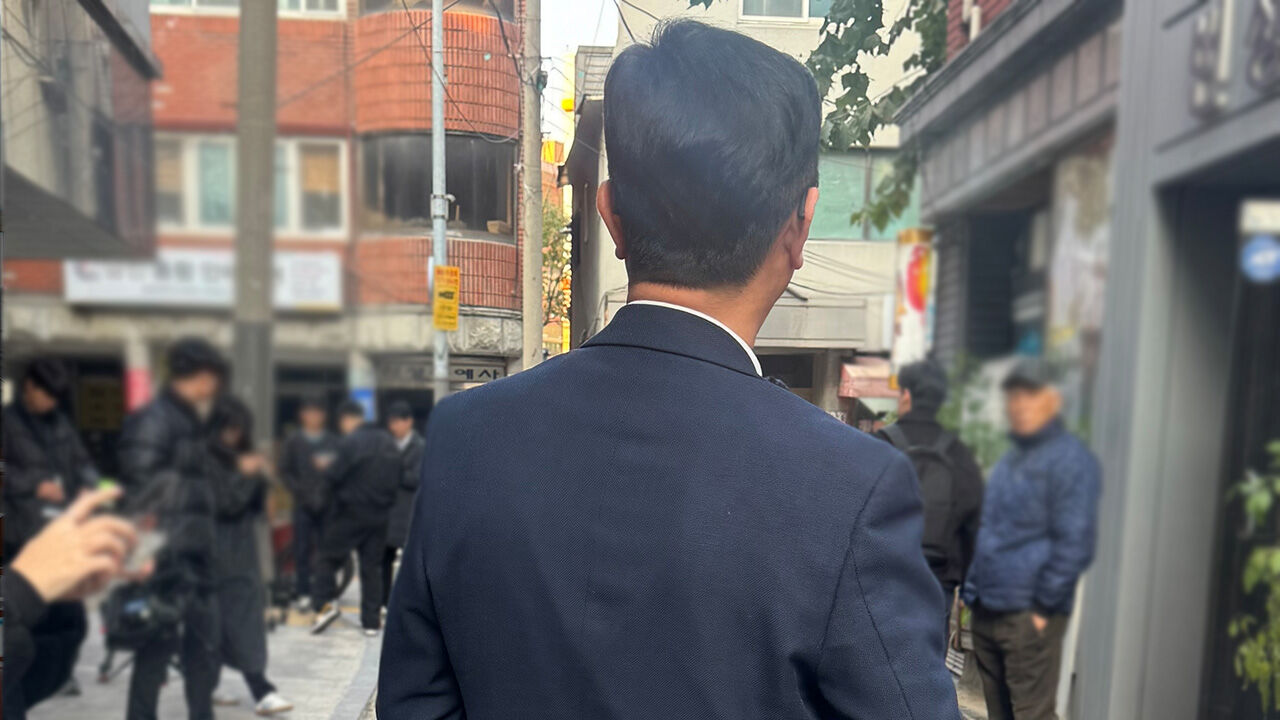 "살려달라" 피 흘리는 여성…뒤쫓던 범인 제압한 양복남