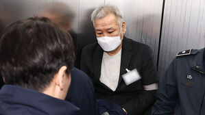 상설특검, '관봉권 띠지 폐기 의혹' 건진법사 참고인 조사