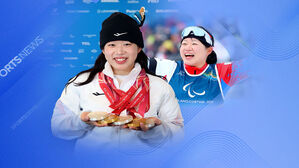 '두 팔'로 달린 58km&hellip;역사를 쓴 '미소 천사'