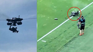 Camera Plummets During Soccer Match After Emitting Smoke Mid-Air