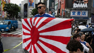 Rising Sun Flag Banned in Stadiums Appears at Japanese Street Cheering Events