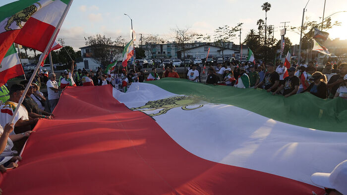 "Not the People's Team, But a Genocidal Regime's": Anti-Government Protests Erupt at Iran's Opening Match