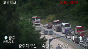 Truck Crashes into Median Barrier, Debris Injures 6