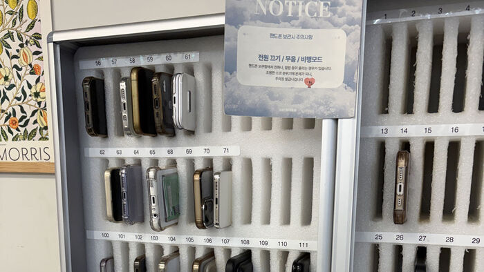 Mobile phones handed in by students before entering are stored in slots by seat number. (Photo: Yonhap News)