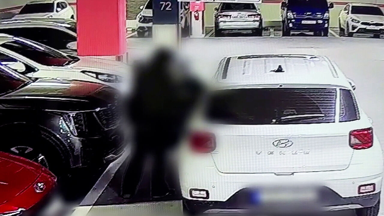Man using someone else's car parked in a lot without permission