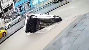 Car Plunges Into Sinkhole on Flooded Road in Turkey