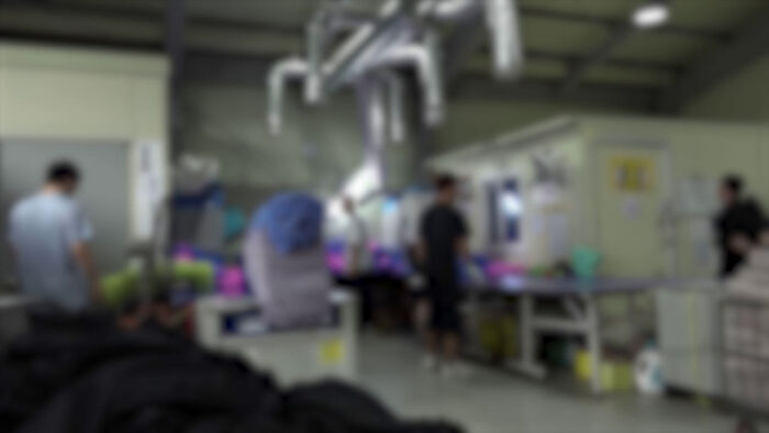The laundry company where an executive in his 60s sexually assaulted an intellectually disabled employee in her 20s