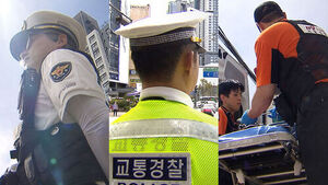 45도까지 치솟는데도&hellip;도로 위 '고군분투' 제복들