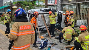 SUV Plunges Through Rooftop Parking Lot of Mart, Driver in 20s Dies