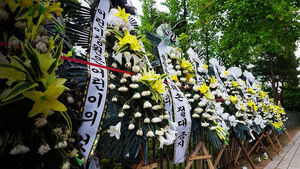 Wreaths of Condolence Line Unexpected Places: Why Local Governments Are Struggling