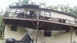 Police Officers Plummet as Deck Collapses During Arrest