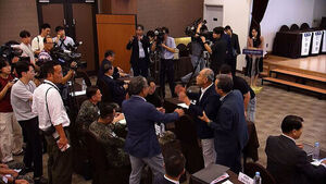 Calling the Government "Thugs": First Public Hearing on Military Academy Integration Descends into Chaos Amid Shouts and Profanity