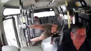 Motorcyclist Flies Through Open Bus Door After Crash