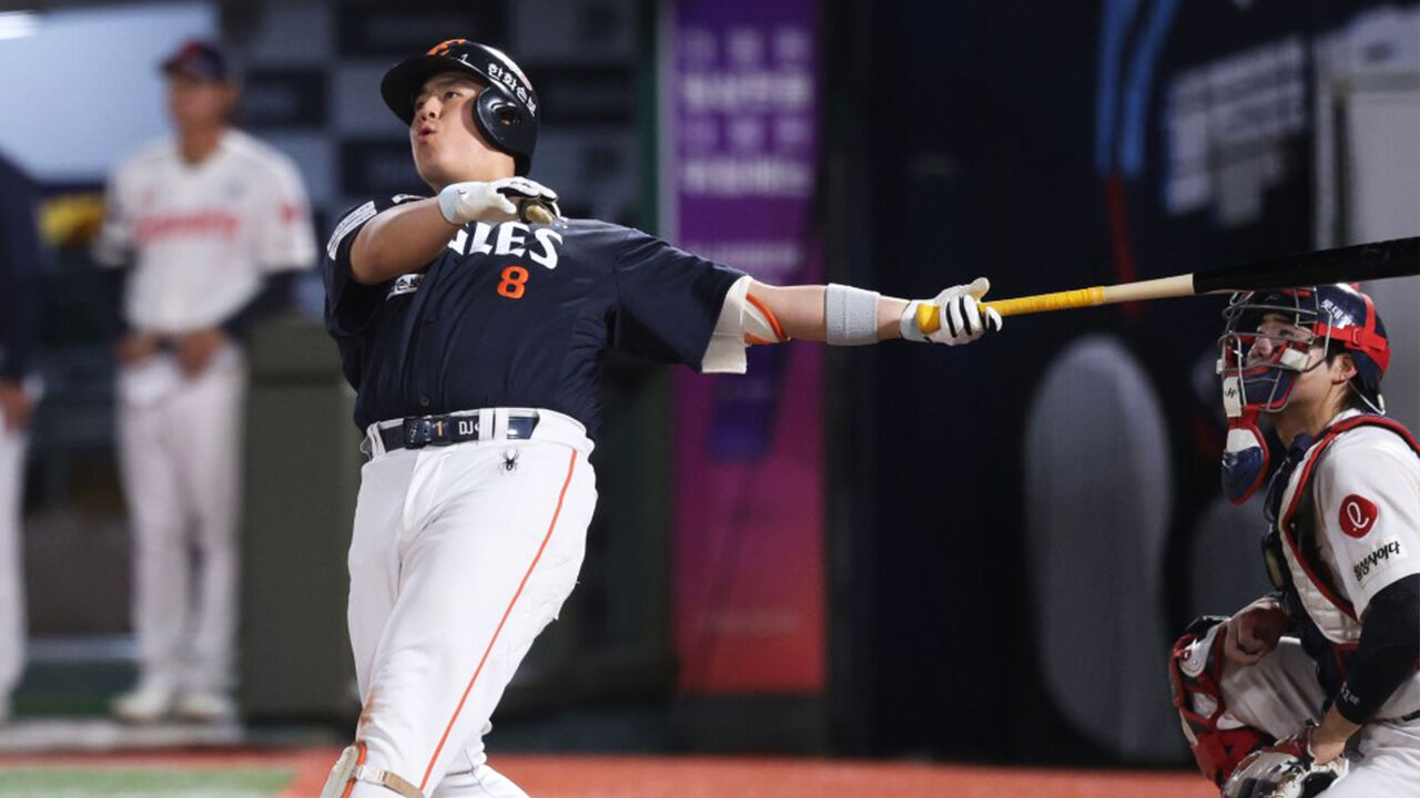 Hanwha's Noh Si-hwan hits a two-run home run in the 3rd inning of the away game against the Lotte Giants for the 2026 professional baseball held at Sajik Baseball Stadium in Busan on the 4th. (Photo provided by Hanwha Eagles, Yonhap News)