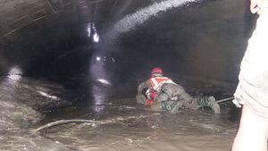 "Hundreds Trapped in Tunnels"... Piles of Mud and Murky Floodwaters