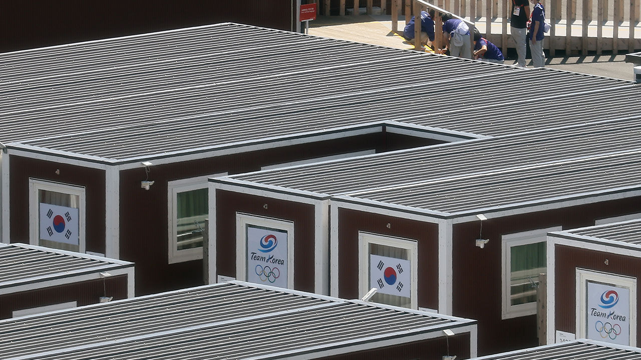 The South Korean flag hangs at a container-style wooden prefabricated accommodation complex set up near the Port of Nagoya in Japan on September 17, two days ahead of the opening of the 2026 Aichi-Nagoya Asian Games. (Photo: Yonhap News)