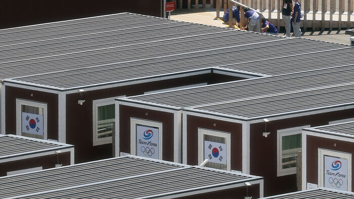 The South Korean flag hangs at a container-style wooden prefabricated accommodation complex set up near the Port of Nagoya in Japan on September 17, two days ahead of the opening of the 2026 Aichi-Nagoya Asian Games. (Photo: Yonhap News)