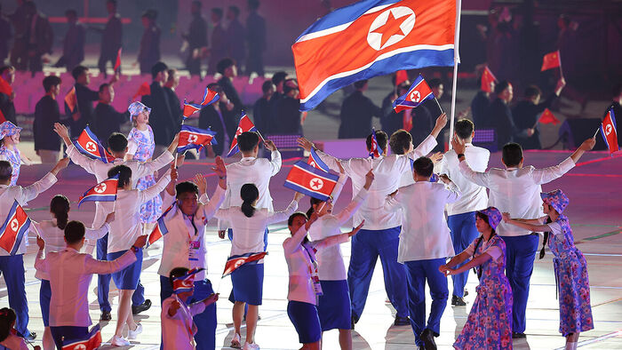 The North Korean delegation enters the opening ceremony of the 2026 Aichi-Nagoya Asian Games held at the Mizuho Park Athletics Stadium in Nagoya, Japan, on the 19th. (Photo: Yonhap News)