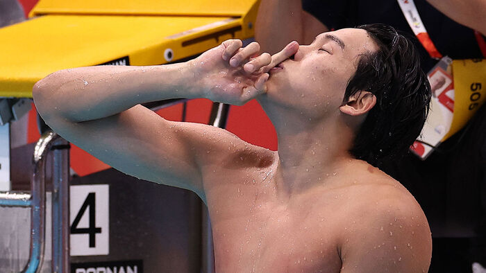 South Korea's Kim Young-beom celebrates after winning the gold medal in the men's 50m freestyle final at the Tokyo Aquatics Centre on September 21 during the 2026 Aichi-Nagoya Asian Games. (Photo: Yonhap News)