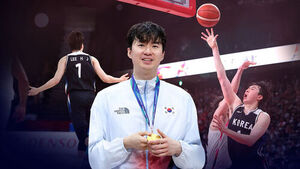 Embrace of the 'Gold Medal Mother and Son'... 'The Best 60th Birthday Gift'