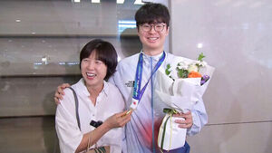 Embrace of the 'Gold Medal Mother and Son'&hellip; "The Best Sixtieth Birthday Gift"