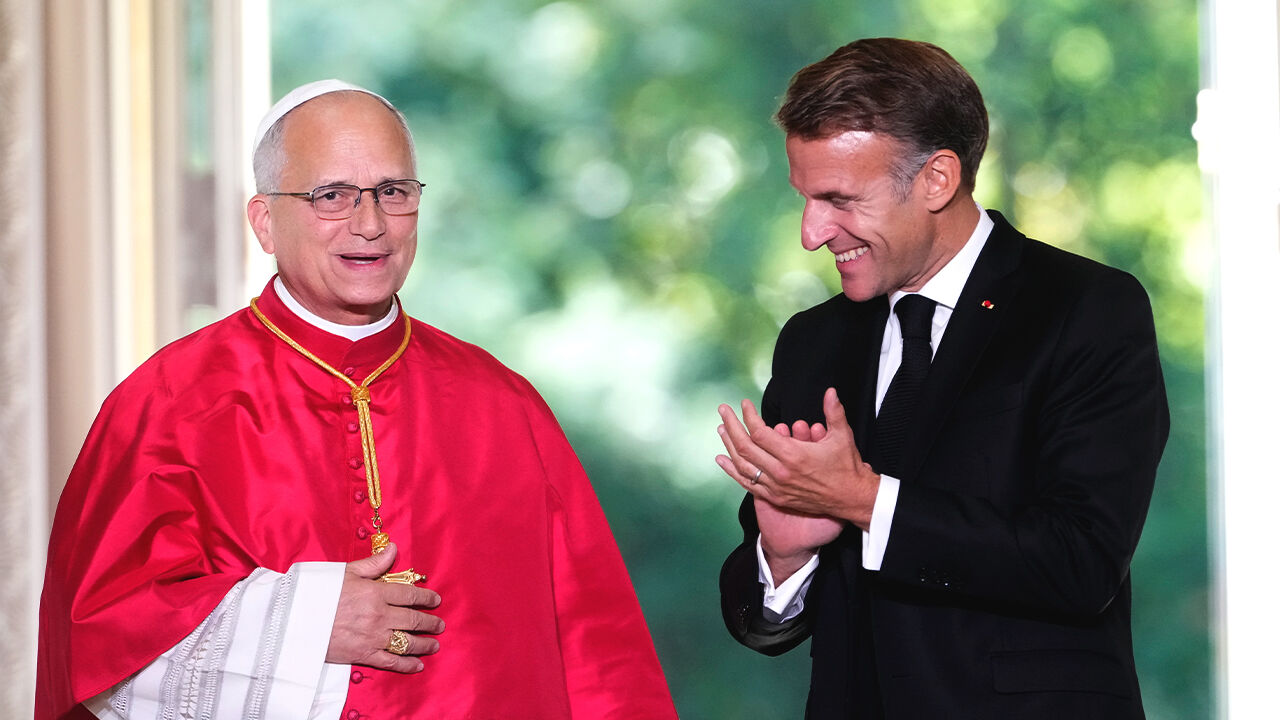 Pope Leo XIV greets French President Emmanuel Macron at the Élysée Palace in Paris. (Photo: AP, Yonhap News)