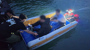 Three, Including Police Officers, Rescued from Tidal Rock in Sacheon After Being Trapped by Rising Tide While Searching for Missing Dementia Patient