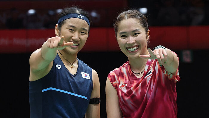 Badminton women's singles world No. 1 An Se-young of South Korea greets opponents after winning her quarterfinal match against Thailand's Ratchanok Intanon at the 2026 Aichi-Nagoya Asian Games held at the Ichinomiya City Gymnasium in Aichi Prefecture, Japan, on September 27.